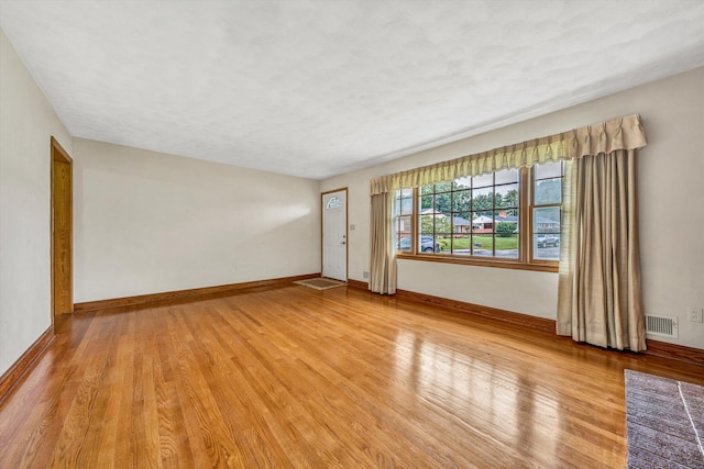 4362 Fontaine Cir, Roanoke, VA 24018 - unfurnished room with light wood-style flooring and baseboards