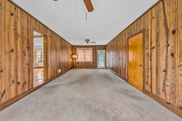 4362 Fontaine Cir, Roanoke, VA 24018 - spare room with ceiling fan, wood walls, and carpet flooring