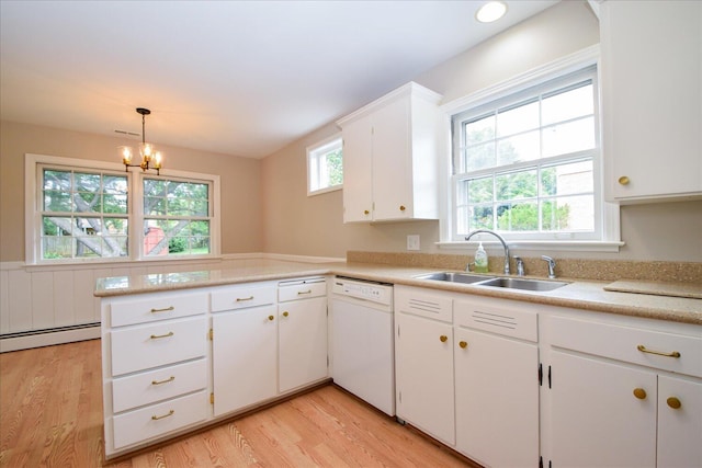 115 Bartley Dr, Salem, VA 24153 - kitchen with dishwasher, baseboard heating, light wood-style flooring, and light countertops
