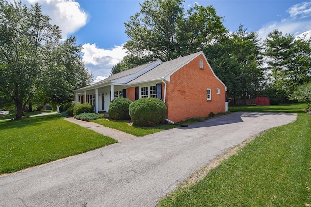115 Bartley Dr, Salem, VA 24153 - view of front of property with brick siding, a front lawn, and asphalt driveway