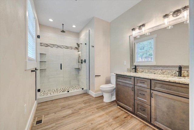 3141 Trinity Rd, Troutville, VA 24175 - full bathroom featuring a stall shower, double vanity, wood finished floors, and recessed lighting