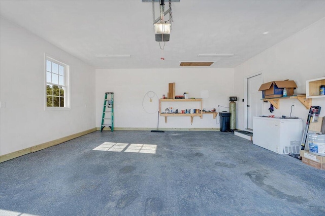 3141 Trinity Rd, Troutville, VA 24175 - garage with a garage door opener and baseboards
