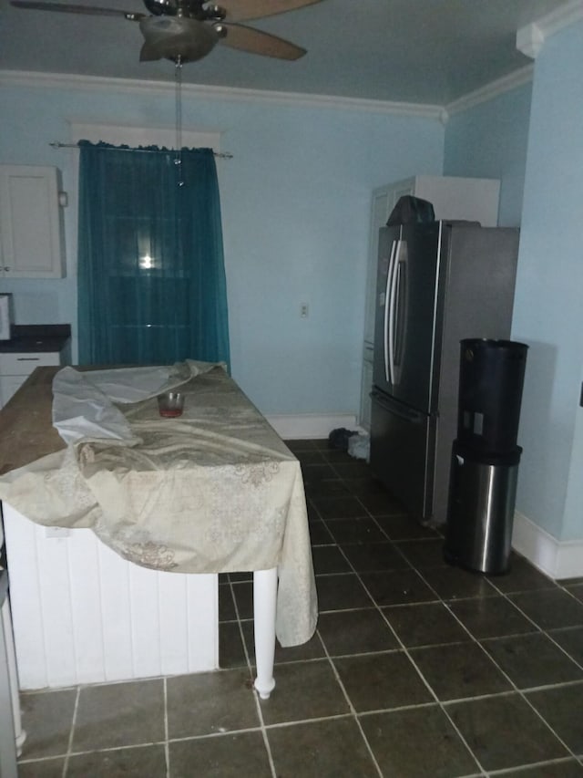 918 Dale Ave SE, Roanoke, VA 24013 - bedroom with crown molding, freestanding refrigerator, dark tile patterned flooring, and ceiling fan
