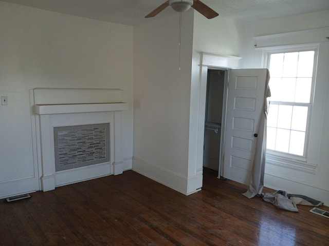 918 Dale Ave SE, Roanoke, VA 24013 - unfurnished living room featuring dark wood-style flooring, a fireplace, and a ceiling fan