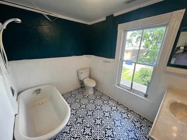 405 Mountain Ave SW, Roanoke, VA 24016 - full bath featuring a freestanding bath, healthy amount of natural light, a wainscoted wall, vanity, and ornamental molding