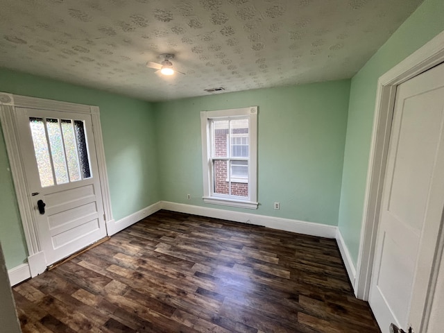 405 Mountain Ave SW, Roanoke, VA 24016 - unfurnished room with dark wood-type flooring and a ceiling fan
