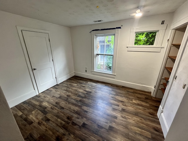 405 Mountain Ave SW, Roanoke, VA 24016 - spare room with dark wood-style floors and ceiling fan