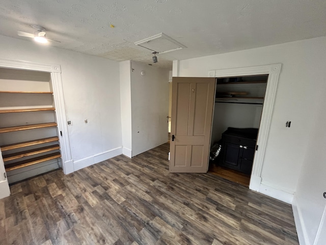 405 Mountain Ave SW, Roanoke, VA 24016 - unfurnished bedroom featuring dark wood-style floors, attic access, and a textured ceiling