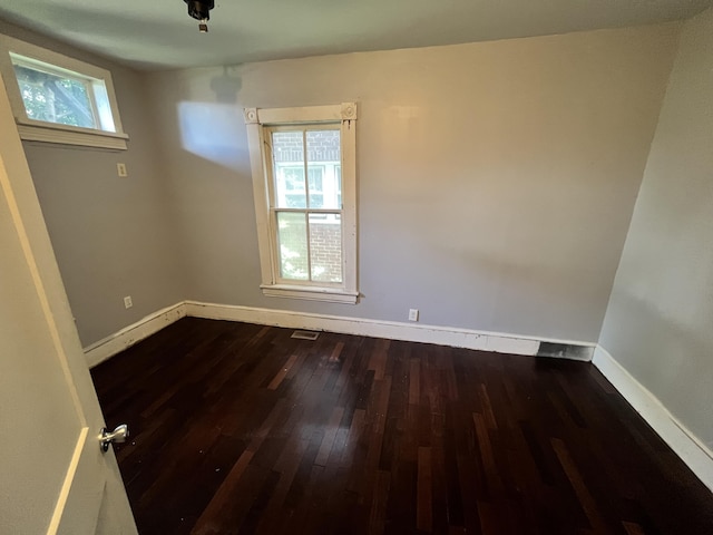 405 Mountain Ave SW, Roanoke, VA 24016 - empty room with dark wood finished floors and baseboards