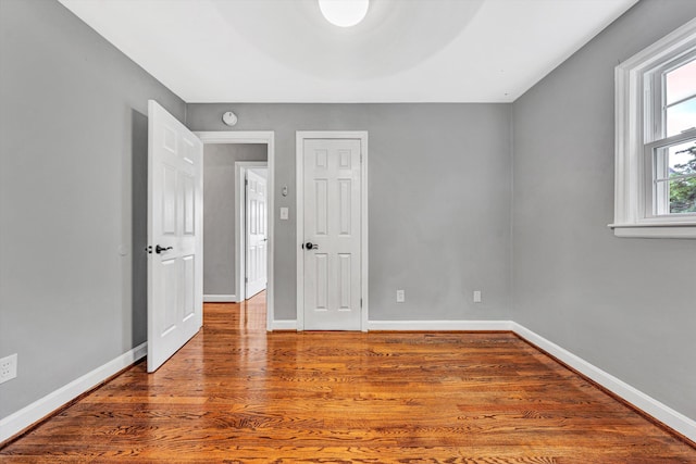 3717 Martinell Ave, Roanoke, VA 24018 - spare room with wood finished floors and a smoke detector