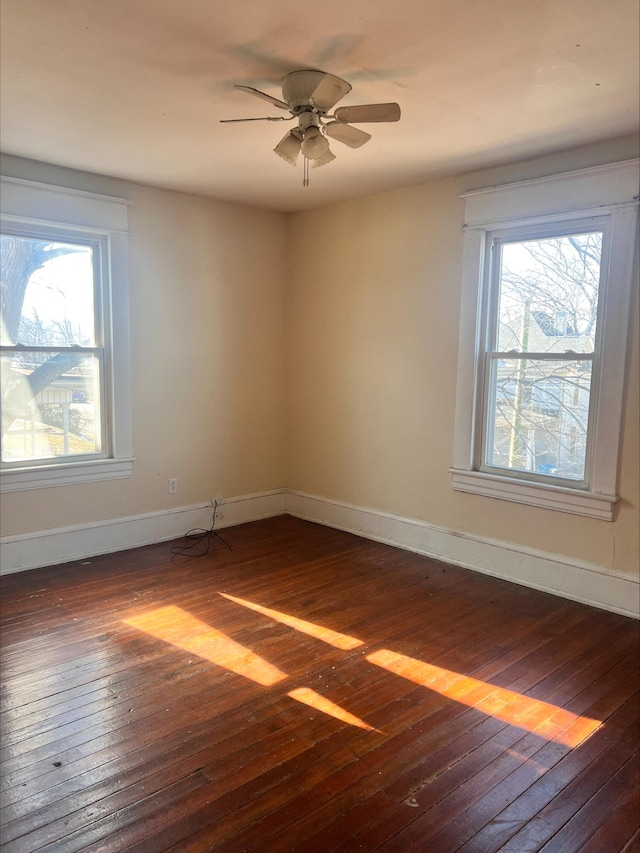 906 5th St SE, Roanoke, VA 24013 - spare room with dark wood-style floors and a ceiling fan