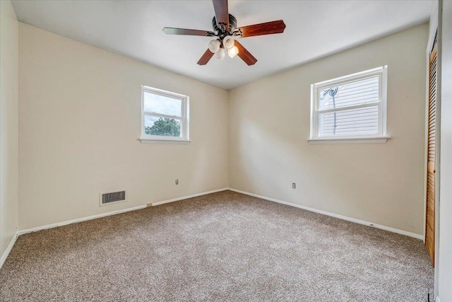 618 Gladies St NW, Roanoke, VA 24017 - unfurnished room with carpet floors and ceiling fan