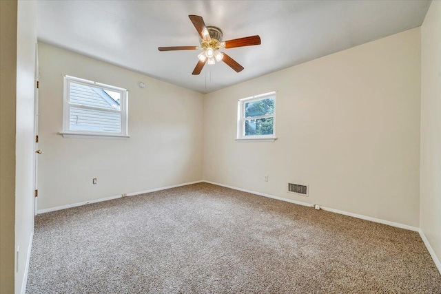 618 Gladies St NW, Roanoke, VA 24017 - carpeted empty room with ceiling fan and baseboards