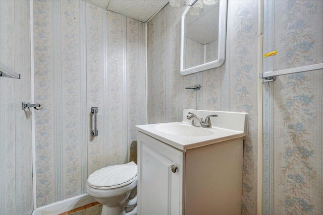 618 Gladies St NW, Roanoke, VA 24017 - bathroom with vanity and wallpapered walls