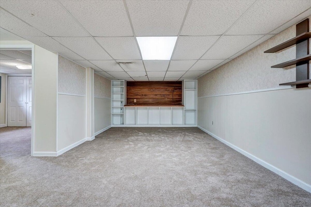 618 Gladies St NW, Roanoke, VA 24017 - finished below grade area with carpet floors, a paneled ceiling, and wainscoting