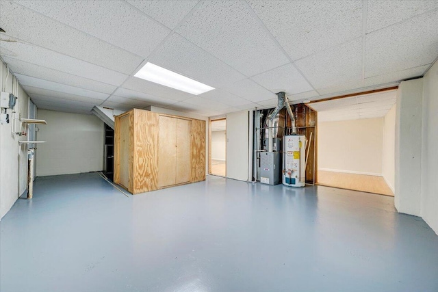 618 Gladies St NW, Roanoke, VA 24017 - finished basement featuring water heater, a paneled ceiling, and heating unit