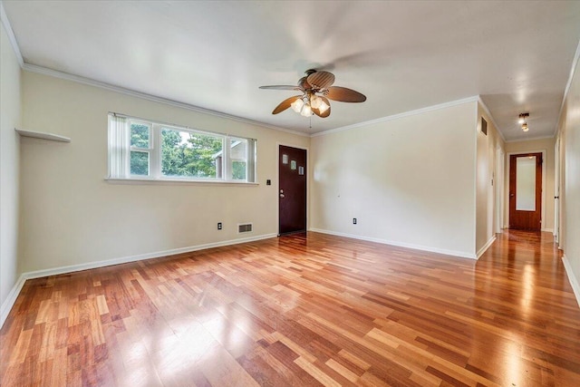 618 Gladies St NW, Roanoke, VA 24017 - empty room featuring light wood finished floors, a ceiling fan, and crown molding