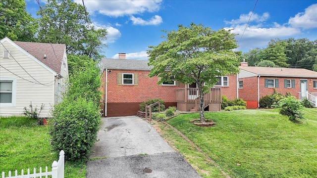 618 Gladies St NW, Roanoke, VA 24017 - view of front of home featuring a chimney and brick siding