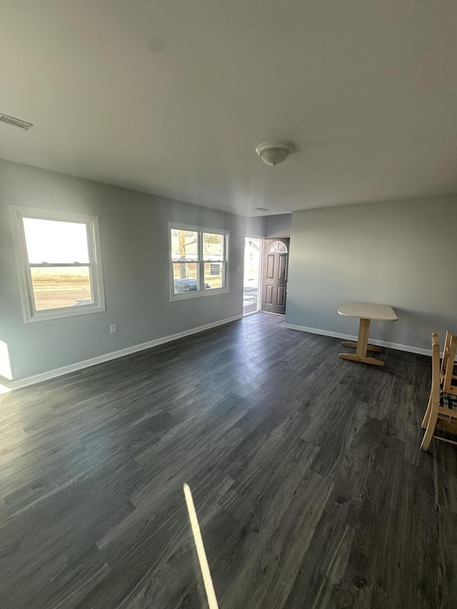 1626 9th St SE, Roanoke, VA 24013 - empty room with baseboards and dark wood finished floors