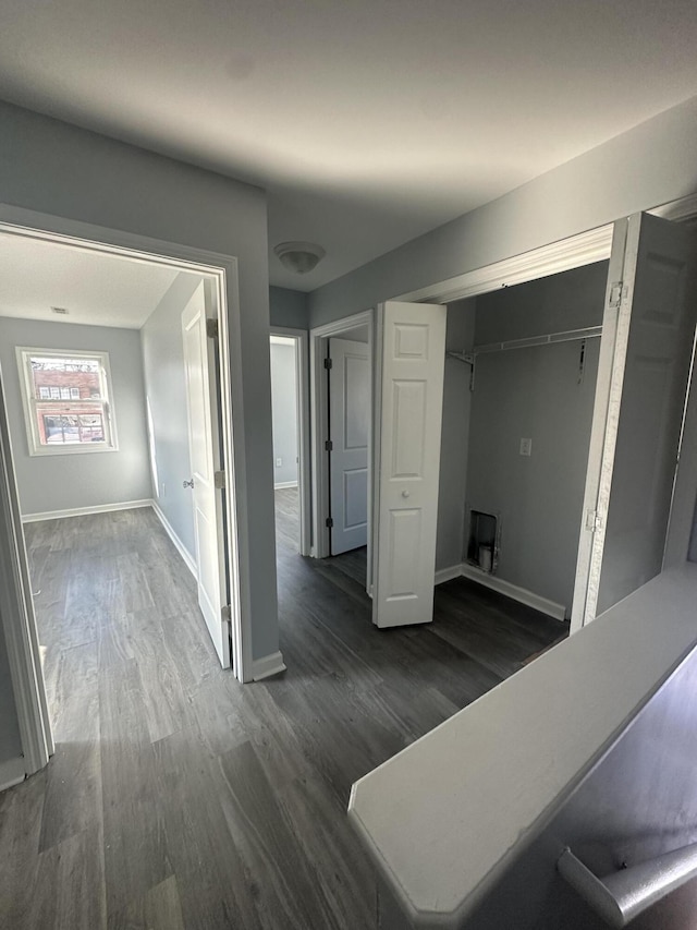 1626 9th St SE, Roanoke, VA 24013 - hallway with dark wood-type flooring and baseboards