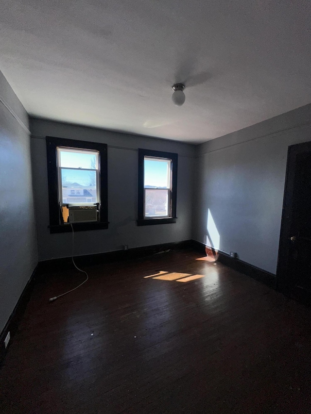 2229 Hanover Ave NW, Roanoke, VA 24017 - empty room with wood finished floors and cooling unit