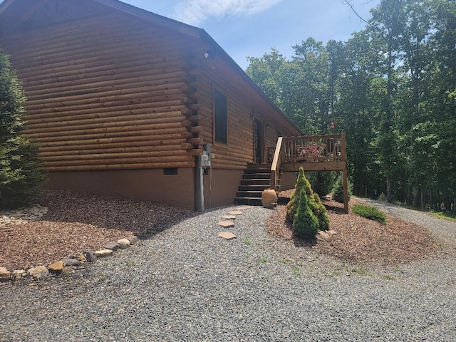 350 Sizer Ln, New Castle, VA 24127 - view of home's exterior with log siding, stairs, and a wooden deck