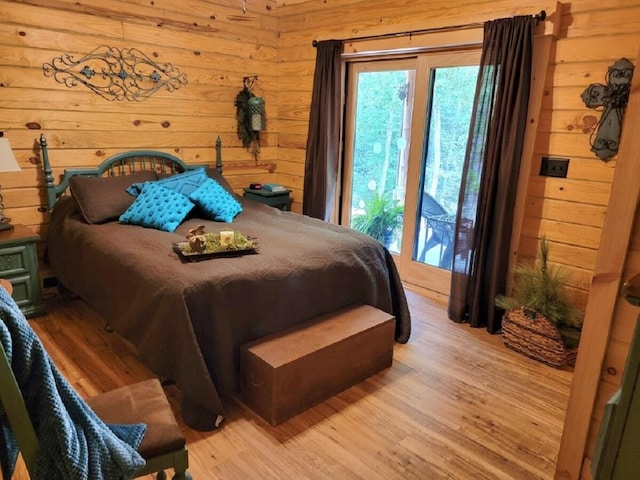 350 Sizer Ln, New Castle, VA 24127 - bedroom with wood walls and light wood finished floors