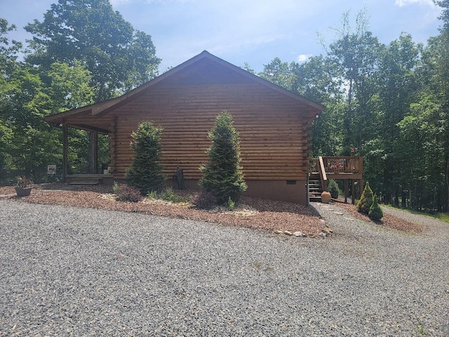 350 Sizer Ln, New Castle, VA 24127 - view of home's exterior featuring log siding, a deck, crawl space, and stairway