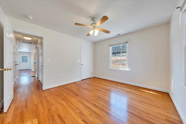 2534 Paris Mountain Rd, Elliston, VA 24087 - unfurnished bedroom featuring light wood-style floors and a ceiling fan