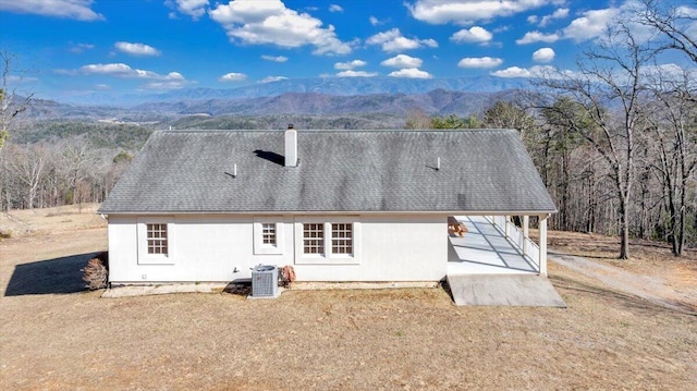 2534 Paris Mountain Rd, Elliston, VA 24087 - back of house featuring a mountain view, a chimney, and a shingled roof