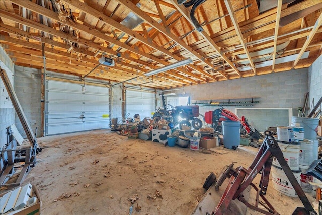 2534 Paris Mountain Rd, Elliston, VA 24087 - garage with a garage door opener and concrete block wall