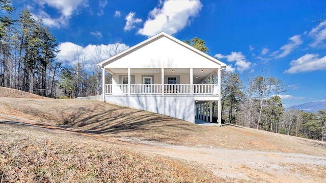 2534 Paris Mountain Rd, Elliston, VA 24087 - view of front of house featuring covered porch and dirt driveway