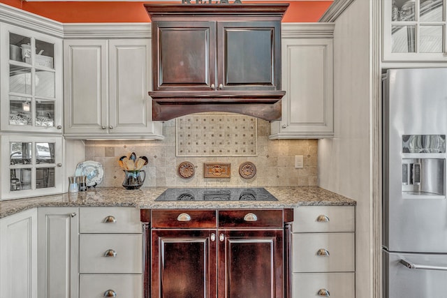 325 Bull Run Trl, Penhook, VA 24137 - kitchen featuring stainless steel fridge with ice dispenser, black electric cooktop, glass insert cabinets, tasteful backsplash, and white cabinets