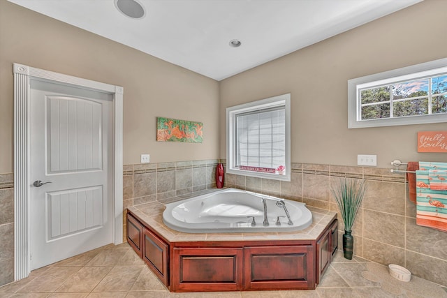 325 Bull Run Trl, Penhook, VA 24137 - full bath with tile walls, tile patterned floors, a garden tub, and wainscoting