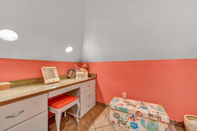 325 Bull Run Trl, Penhook, VA 24137 - bedroom with built in desk, light tile patterned floors, and lofted ceiling