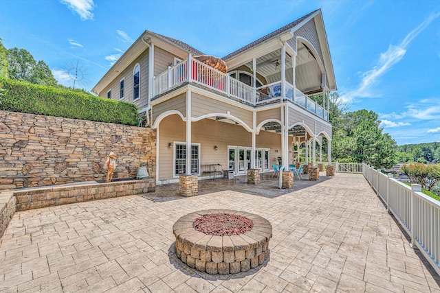 325 Bull Run Trl, Penhook, VA 24137 - back of house with a balcony, a fenced backyard, a patio, and french doors
