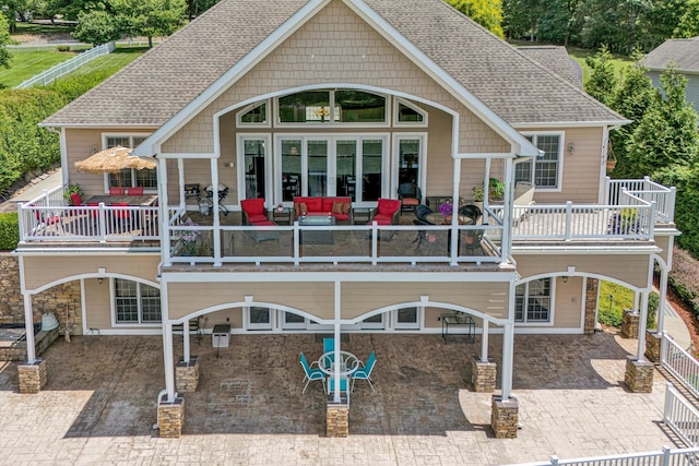 325 Bull Run Trl, Penhook, VA 24137 - back of property featuring a carport, a patio, a balcony, and a shingled roof