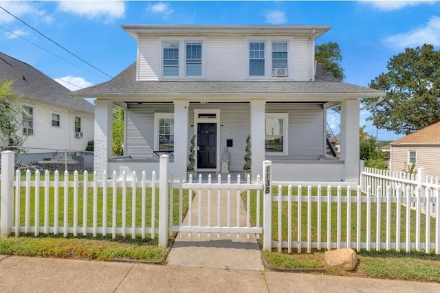 1138 Montrose Ave SE, Roanoke, VA 24013 - bungalow-style house with covered porch, a fenced front yard, and roof with shingles