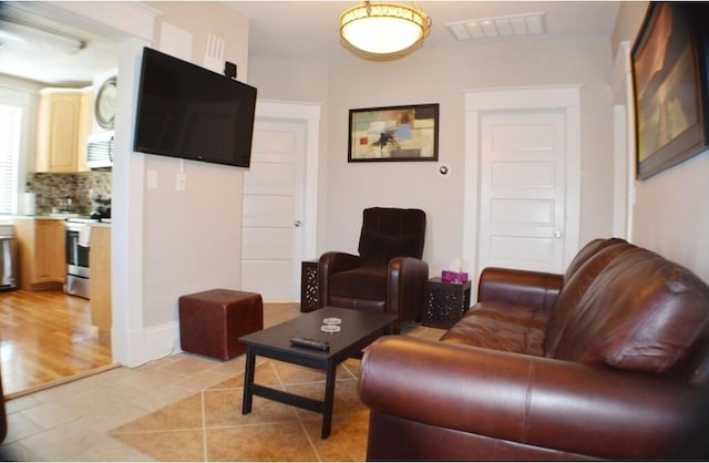 1138 Montrose Ave SE, Roanoke, VA 24013 - living room with light tile patterned flooring