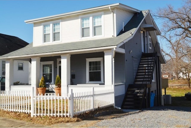 1138 Montrose Ave SE, Roanoke, VA 24013 - view of front of property with covered porch, stairway, and a fenced front yard