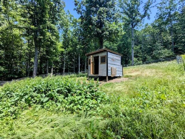 221 Camp Creek Rd NW, Riner, VA 24149 - view of shed with a view of trees