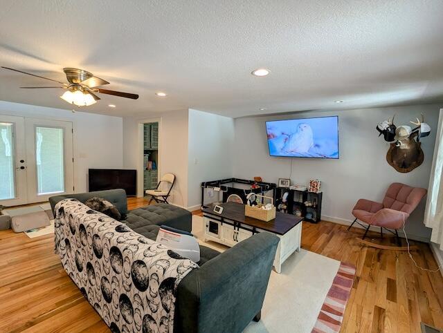 221 Camp Creek Rd NW, Riner, VA 24149 - living area with wood finished floors, french doors, recessed lighting, and ceiling fan