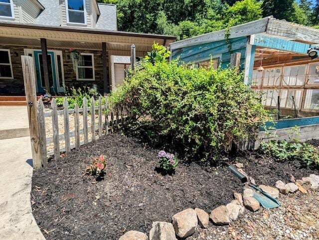 221 Camp Creek Rd NW, Riner, VA 24149 - fenced yard featuring covered porch