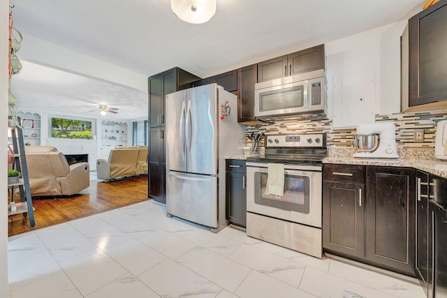 105 Barnette Rd, Salem, VA 24153 - kitchen with stainless steel appliances, a ceiling fan, open floor plan, and dark brown cabinetry
