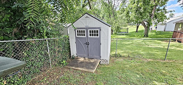 2610 Plantation Rd NE, Roanoke, VA 24012 - view of shed with a trampoline and a fenced backyard