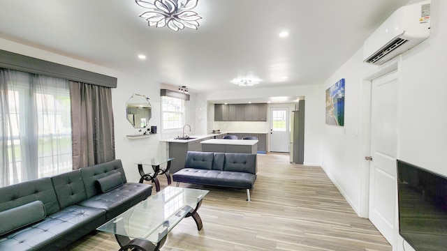 801 Concord St, Selma, VA 24474 - living room featuring a wall mounted AC, healthy amount of natural light, light wood-type flooring, and recessed lighting