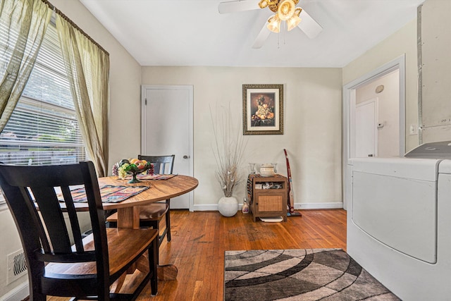 3843 Plantation Rd NE, Roanoke, VA 24012 - dining space with washer / dryer, hardwood / wood-style flooring, and ceiling fan