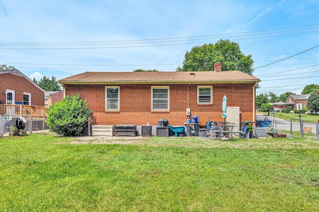 3843 Plantation Rd NE, Roanoke, VA 24012 - rear view of property featuring brick siding and a chimney