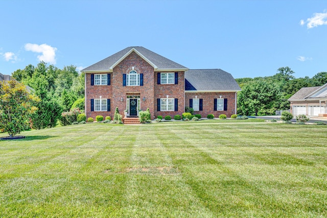 1258 Colby Dr, Forest, VA 24551 - colonial house with a front yard and brick siding