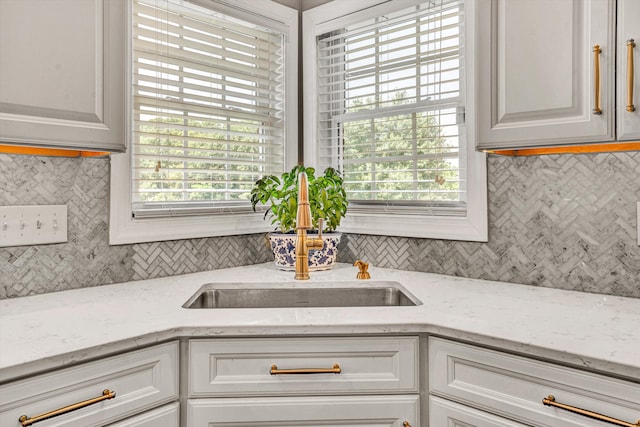 1258 Colby Dr, Forest, VA 24551 - kitchen featuring decorative backsplash, white cabinetry, and light stone countertops